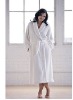 white cotton women's hotel bathrobe