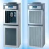 Vertical compressor cooling water dispenser