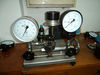 Pressure gauge calibrator