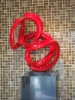 stainless steel abstract sculpture with surface baking varnish disposal