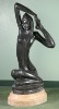 stone sculpture of dancing lady