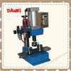 Pneumatic button making machine with three mould