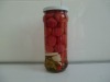 Unpeeled Tomato in jar