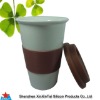 Double wall ceramic coffee cup with slilicone lid and wrapper