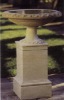 stone planter and pedestals