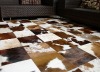 Cowhide patchwork rug