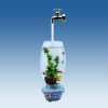 magic water faucet above magic aquarium & fish tank