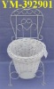 white wicker garden basket with metal chair